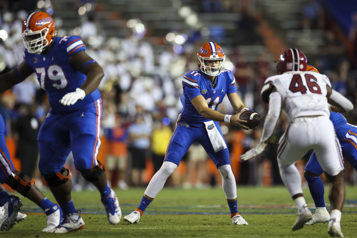 GAINESVILLE, FLORIDA - NOVEMBER 12: Jalen Kitna #11 of the Florida Gators hands the ball off during the second half of a game against the South Carolina Gamecocks at Ben Hill Griffin Stadium on November 12, 2022 in Gainesville, Florida. (Photo by James Gilbert/Getty Images)