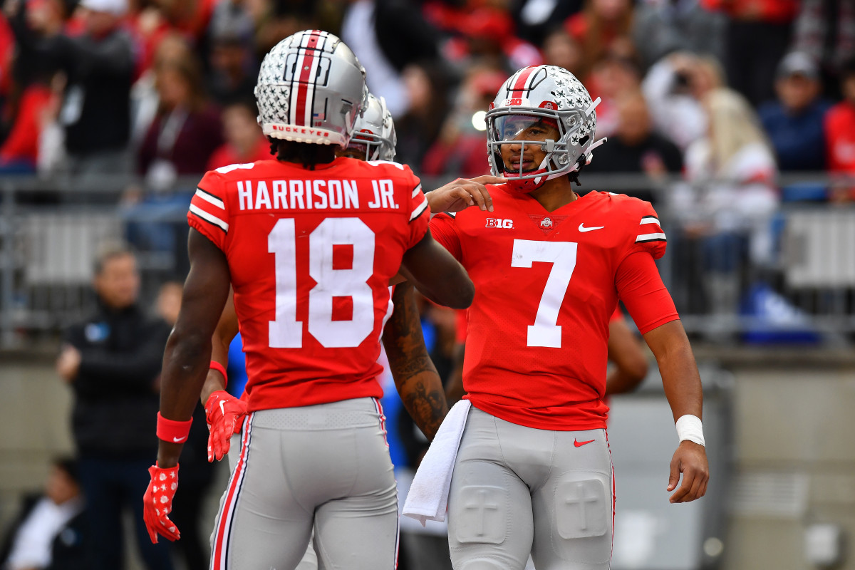 COLUMBUS, OHIO - OCTOBER 01: Marvin Harrison Jr. #18 of the Ohio State Buckeyes celebrates his third quarter touchdown with teammate C.J. Stroud #7 during a game against the Rutgers Scarlet Knights at Ohio Stadium on October 01, 2022 in Columbus, Ohio. (Photo by Ben Jackson/Getty Images)