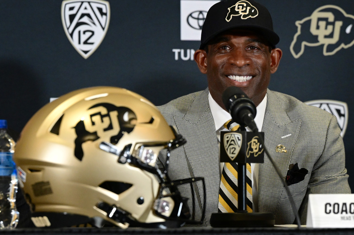 Colorado Buffaloes head coach Deion Sanders meets team mascot and