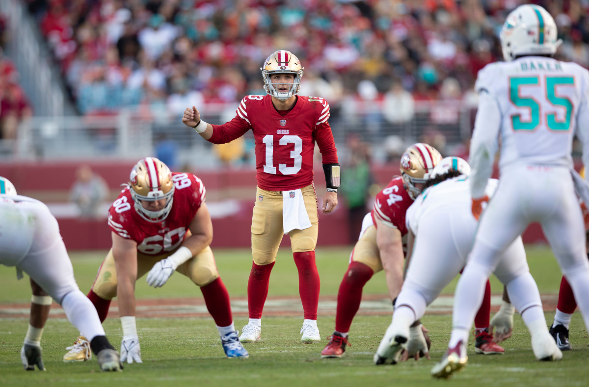 Brock Purdy calls out signals from shotgun for the 49ers.