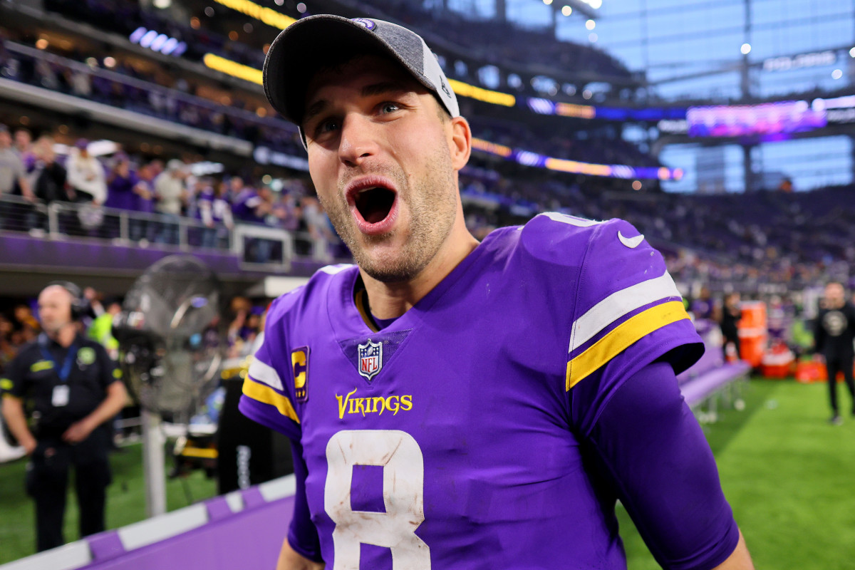 MINNEAPOLIS, MINNESOTA - DECEMBER 17: Kirk Cousins #8 of the Minnesota Vikings celebrates on the field after defeating the Indianapolis Colts at U.S. Bank Stadium on December 17, 2022 in Minneapolis, Minnesota. (Photo by Adam Bettcher/Getty Images)