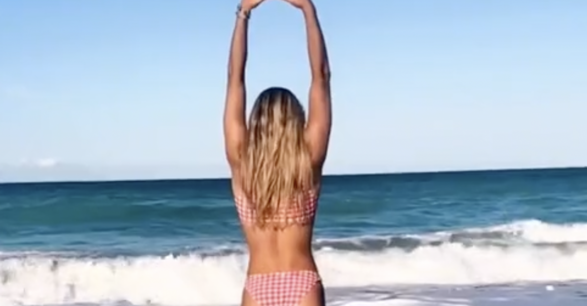 Look Olivia Dunne S Beach Flip Video Is Going Viral The Spun