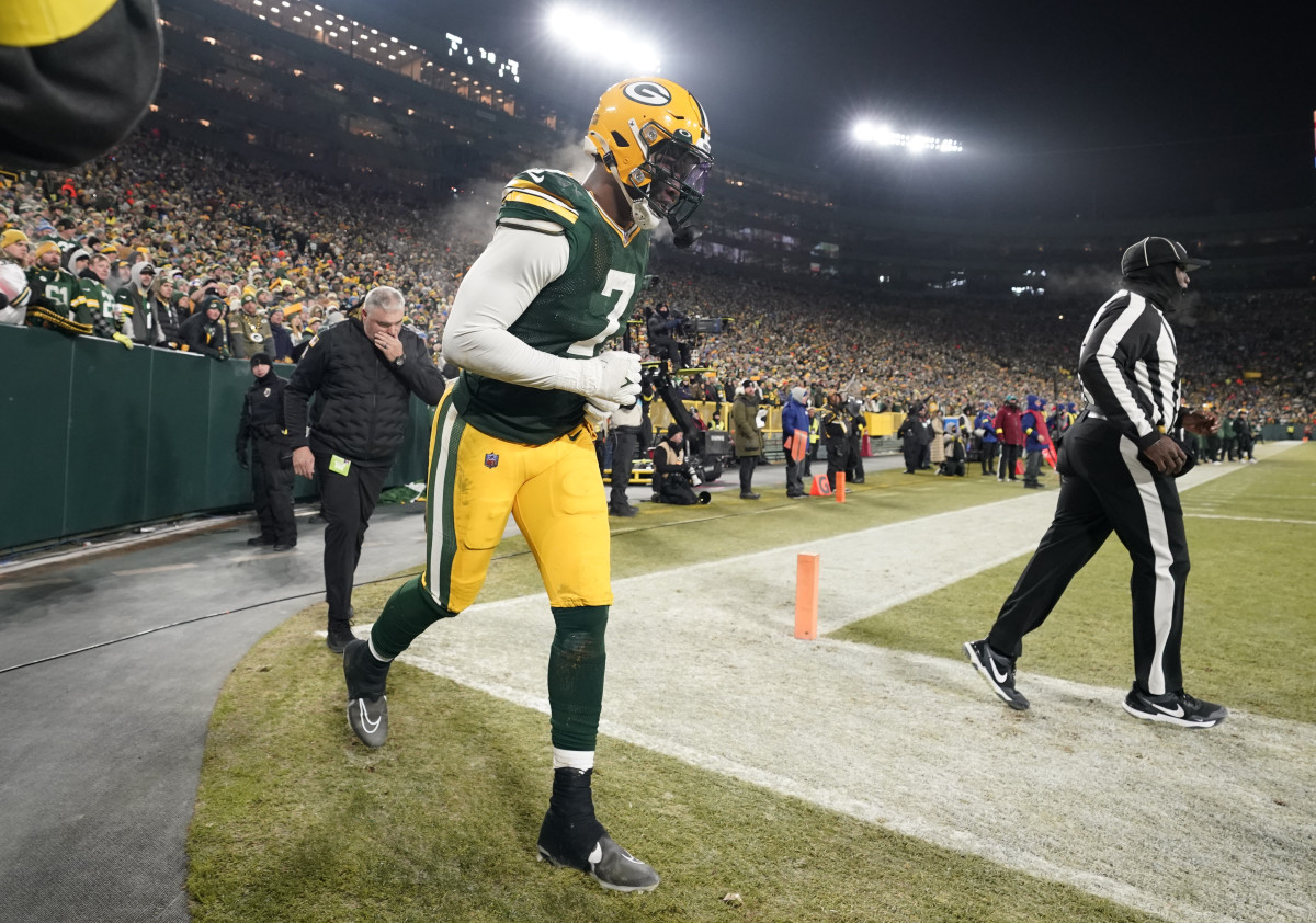 GREEN BAY, WI - JANUARY 08: Green Bay Packers linebacker Quay Walker (7)  celebrates during a game between the Green Bay Packers and the Detroit  Lions at Lambeau Field on January 8