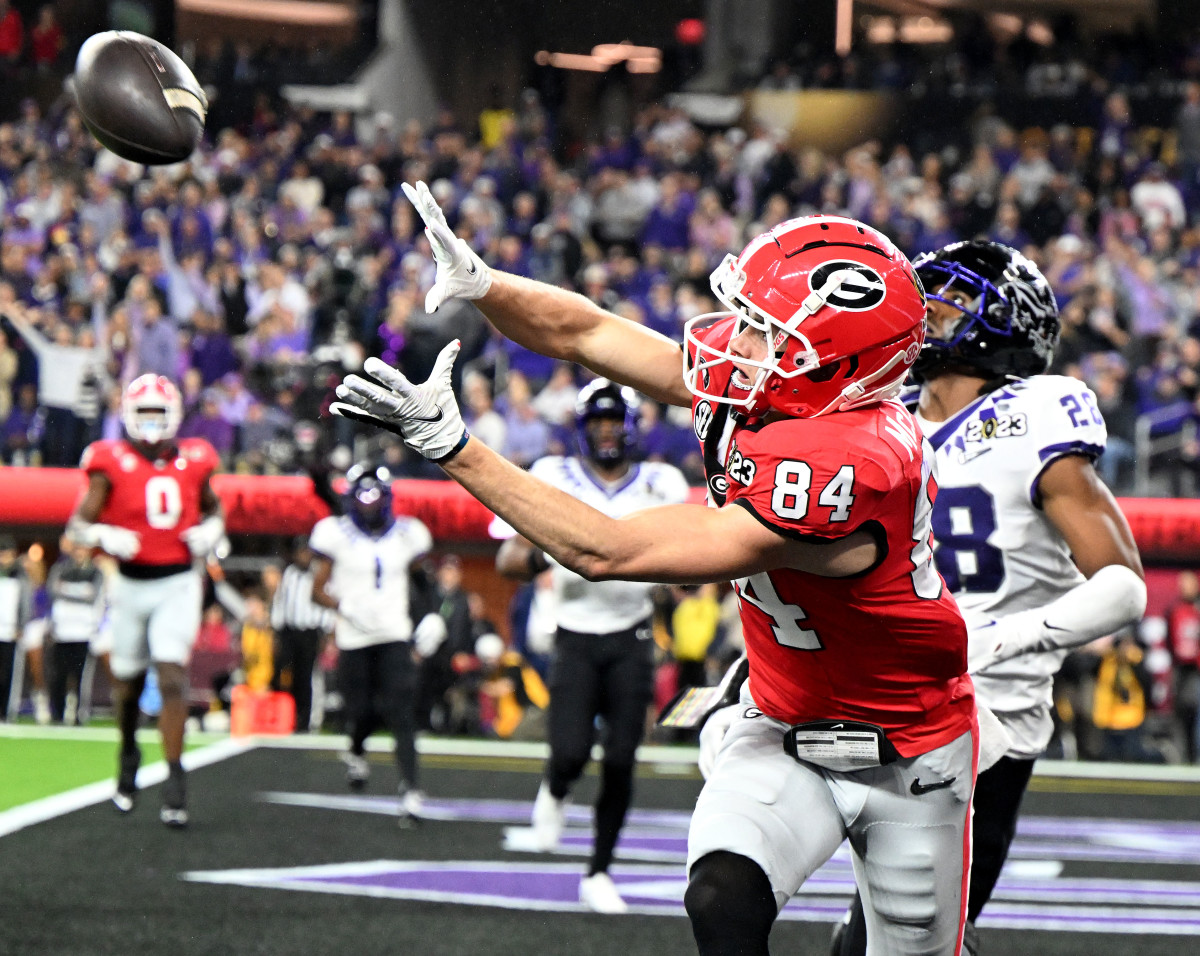 Inglewood, CA - January 09: Ladd McConkey #84 of the Georgia Bulldogs catches a touchdown pass against Millard Bradford #28 of the TCU Horned Frogs during the second half of the CFP National Championship Football game at SoFi Stadium in Inglewood on Monday, January 9, 2023. (Photo by Will Lester/MediaNews Group/Inland Valley Daily Bulletin via Getty Images)