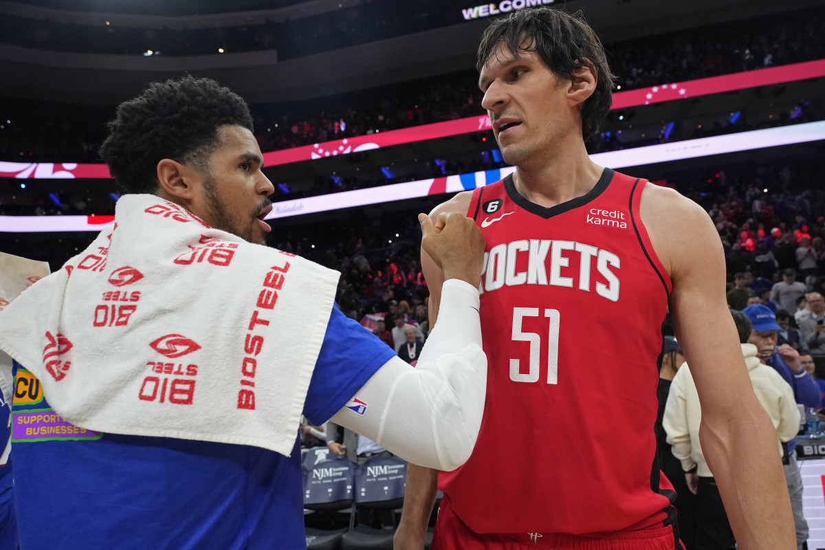 Dallas Mavericks' Boban Marjanovic shakes hands with a fan prior