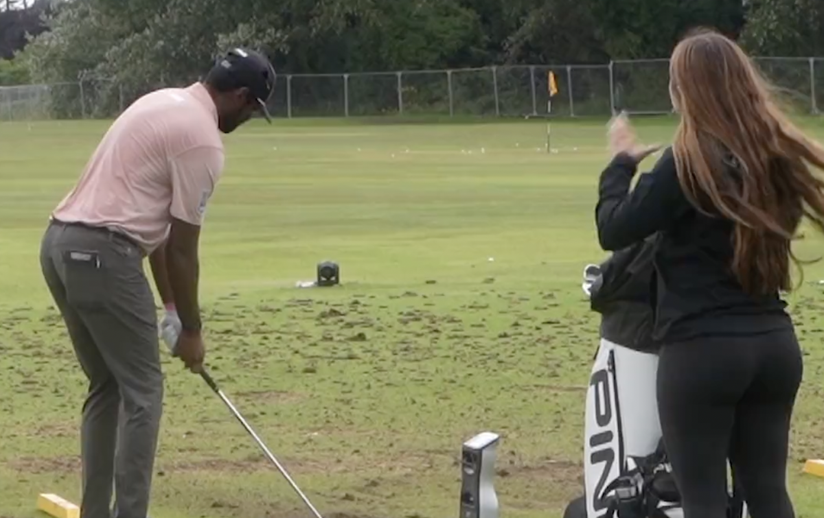 Golfer's Girlfriend Shows Great Loyalty During Open Championship Range