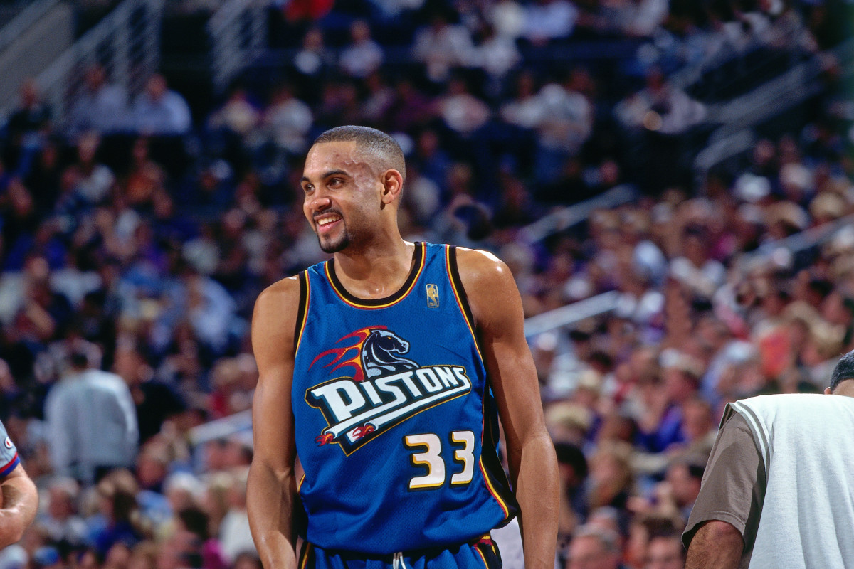 Former Detroit Pistons star Grant Hill on the floor during an NBA game.
