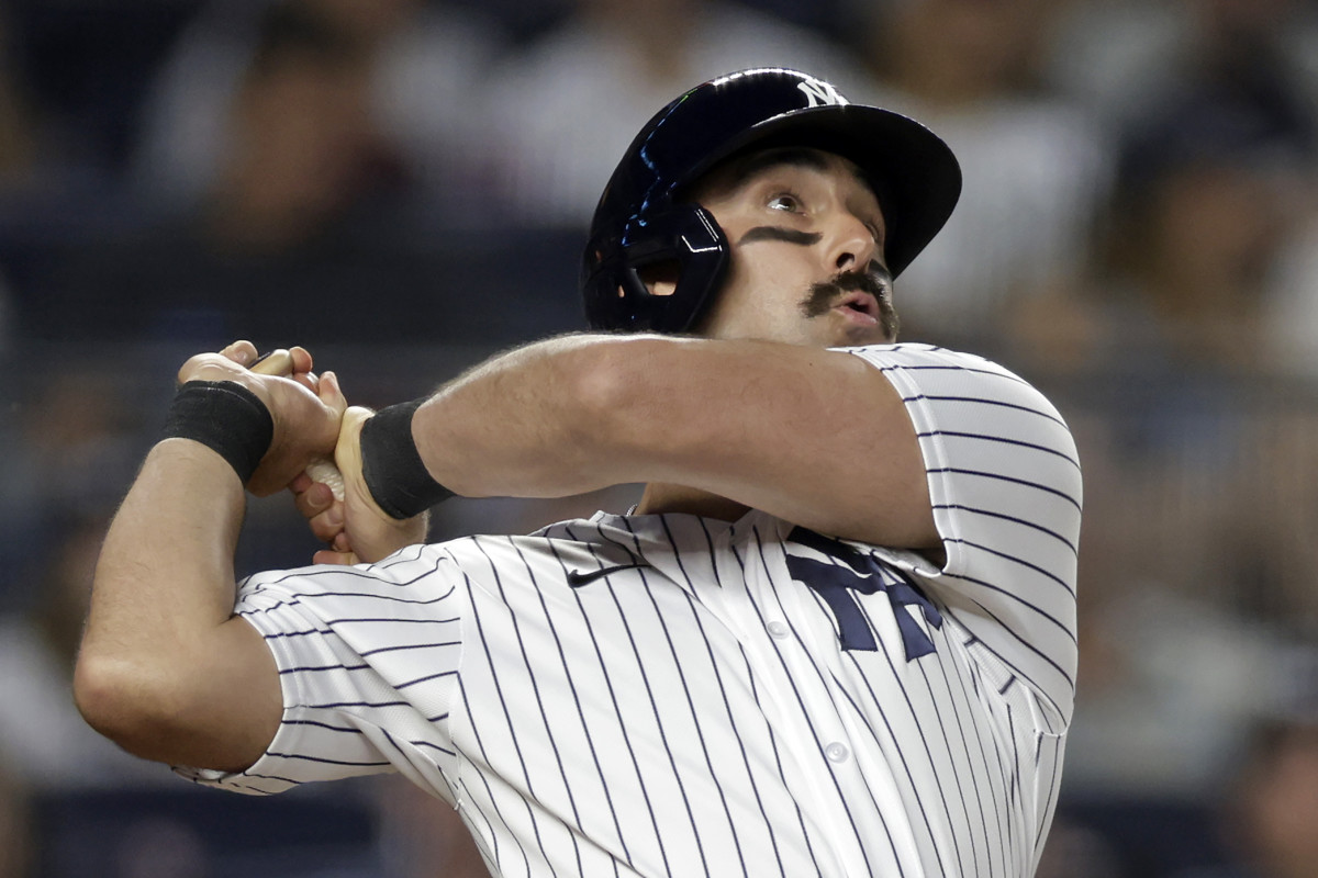 Matt Carpenter swinging a bat for the New York Yankees.