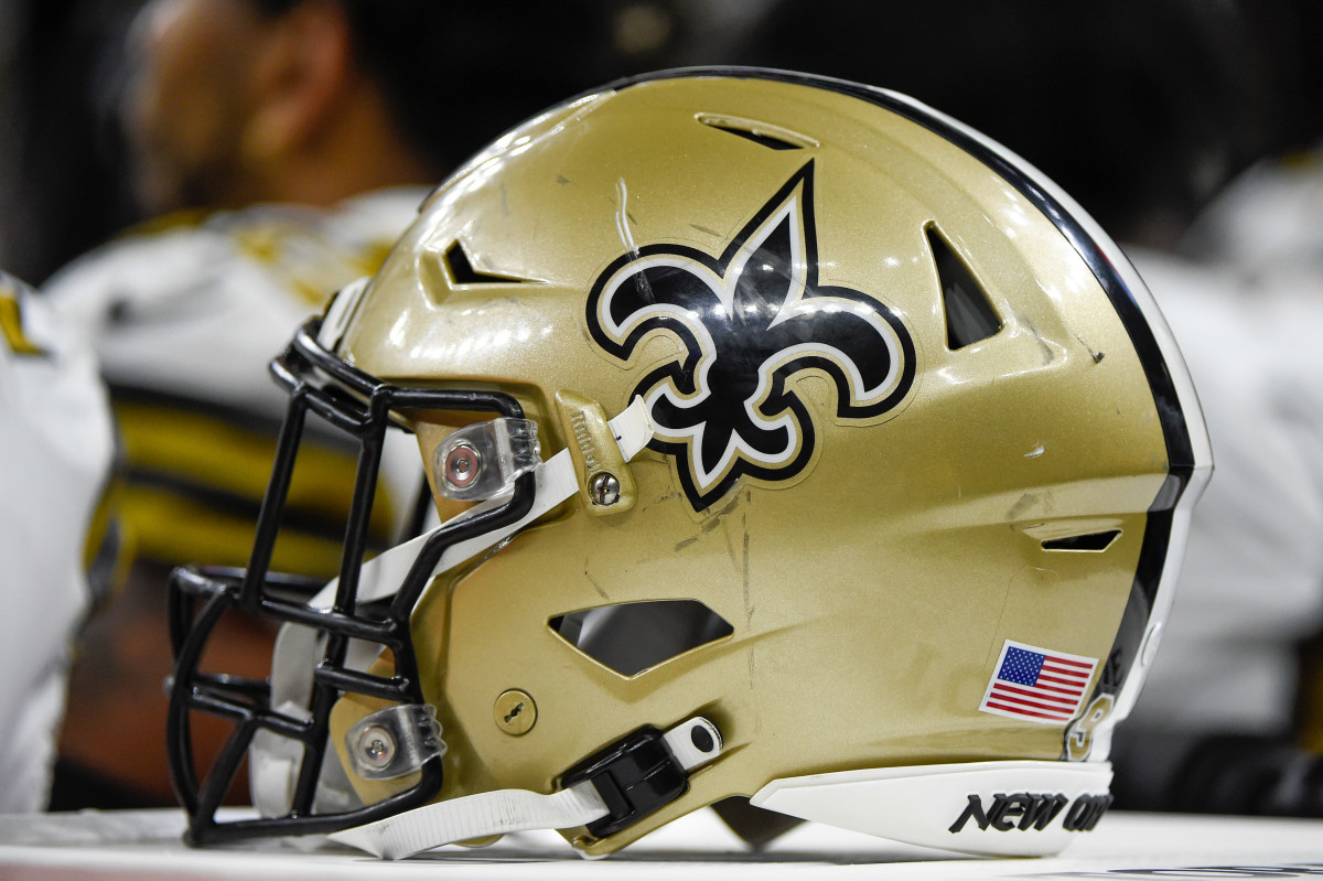 NEW ORLEANS, LA - OCTOBER 31: A New Orleans Saints  helmet awaits the next series during the football game between the Tampa Bay Buccaneers and New Orleans Saints at Caesar's Superdome on October 31, 2021 in New Orleans, LA. (Photo by Ken Murray/Icon Sportswire via Getty Images)