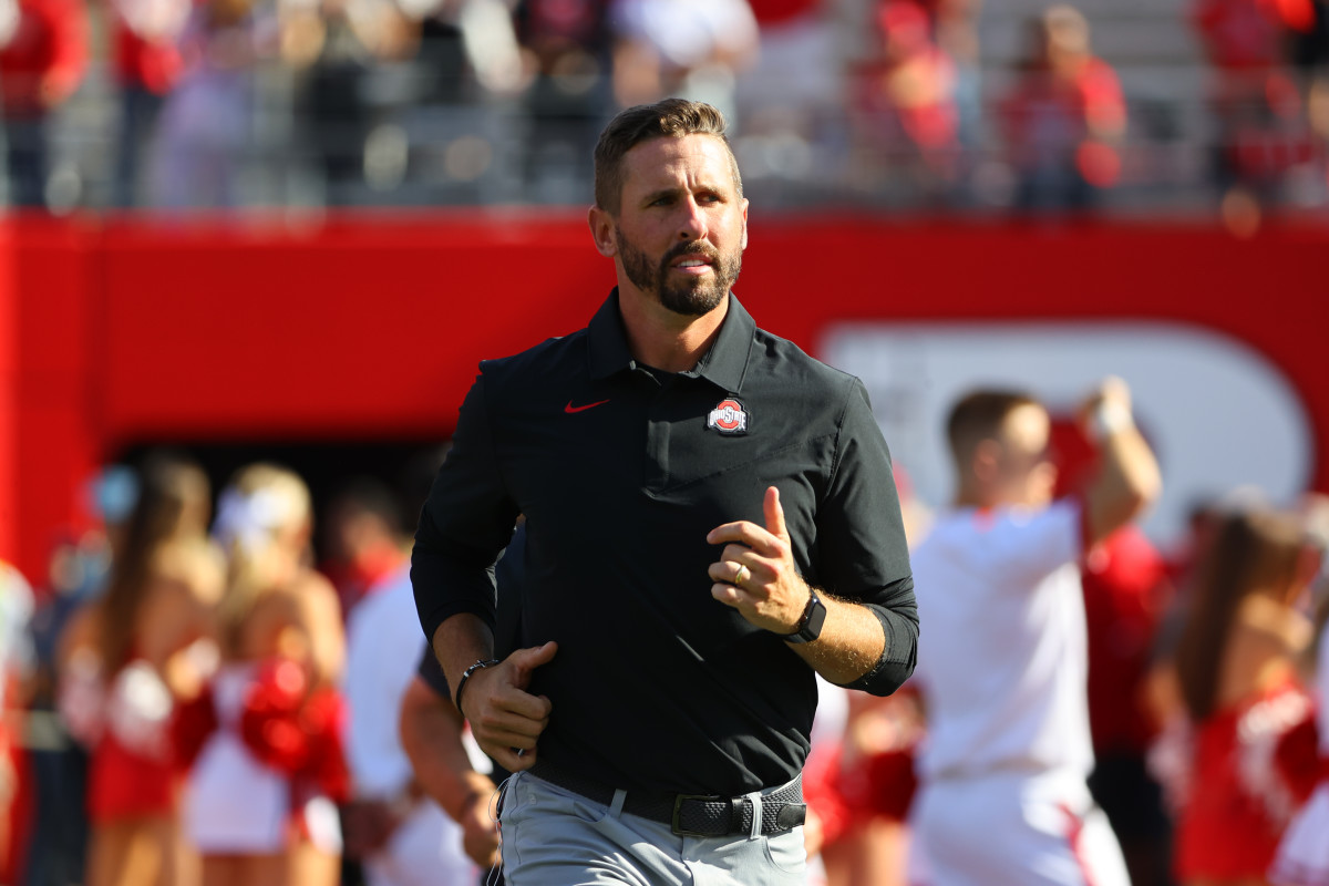 PISCATAWAY, NJ - OCTOBER 02:  Ohio State Buckeyes wide receivers coach Brian Hartline  warms up prior to the college football game between the Ohio State Buckeyes and Rutgers Scarlet Knights on October 2,2021 at SHI Stadium in Piscataway NJ.  (Photo by Rich Graessle/Icon Sportswire via Getty Images)
