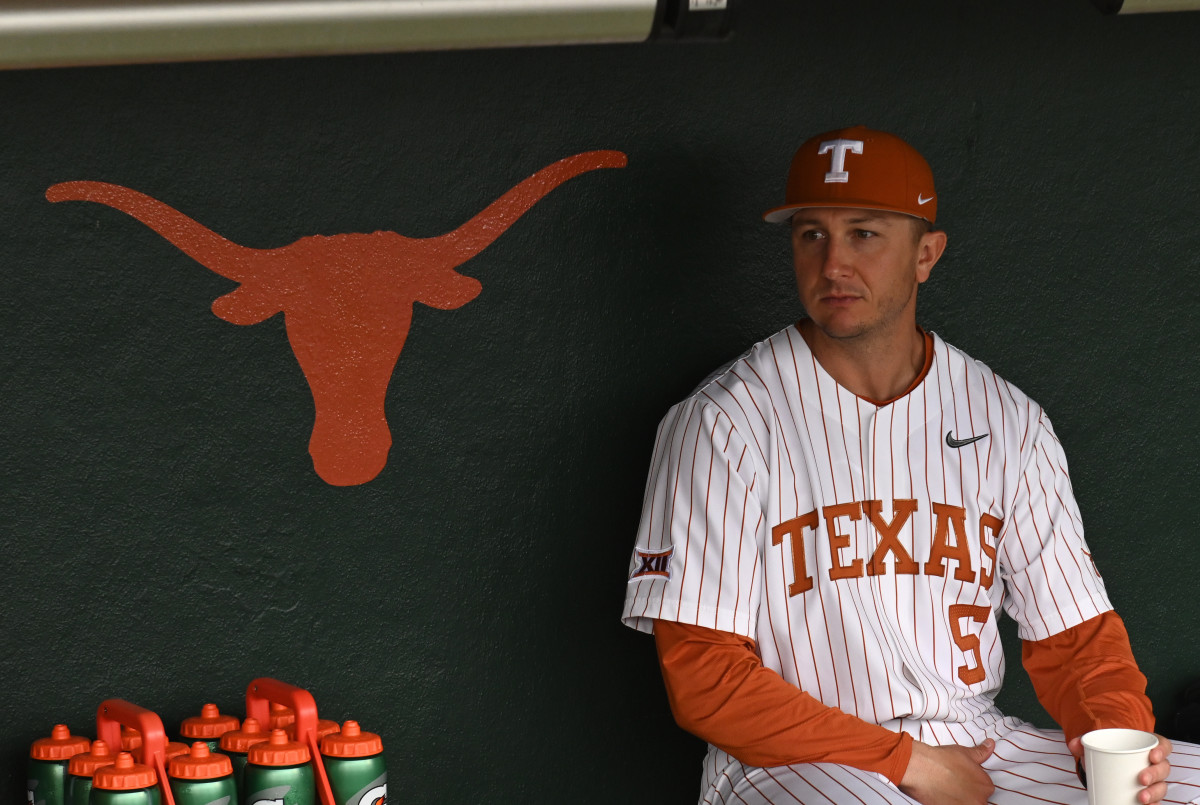 Troy Tulowitzki sitting in Texas' dugout on February 23.