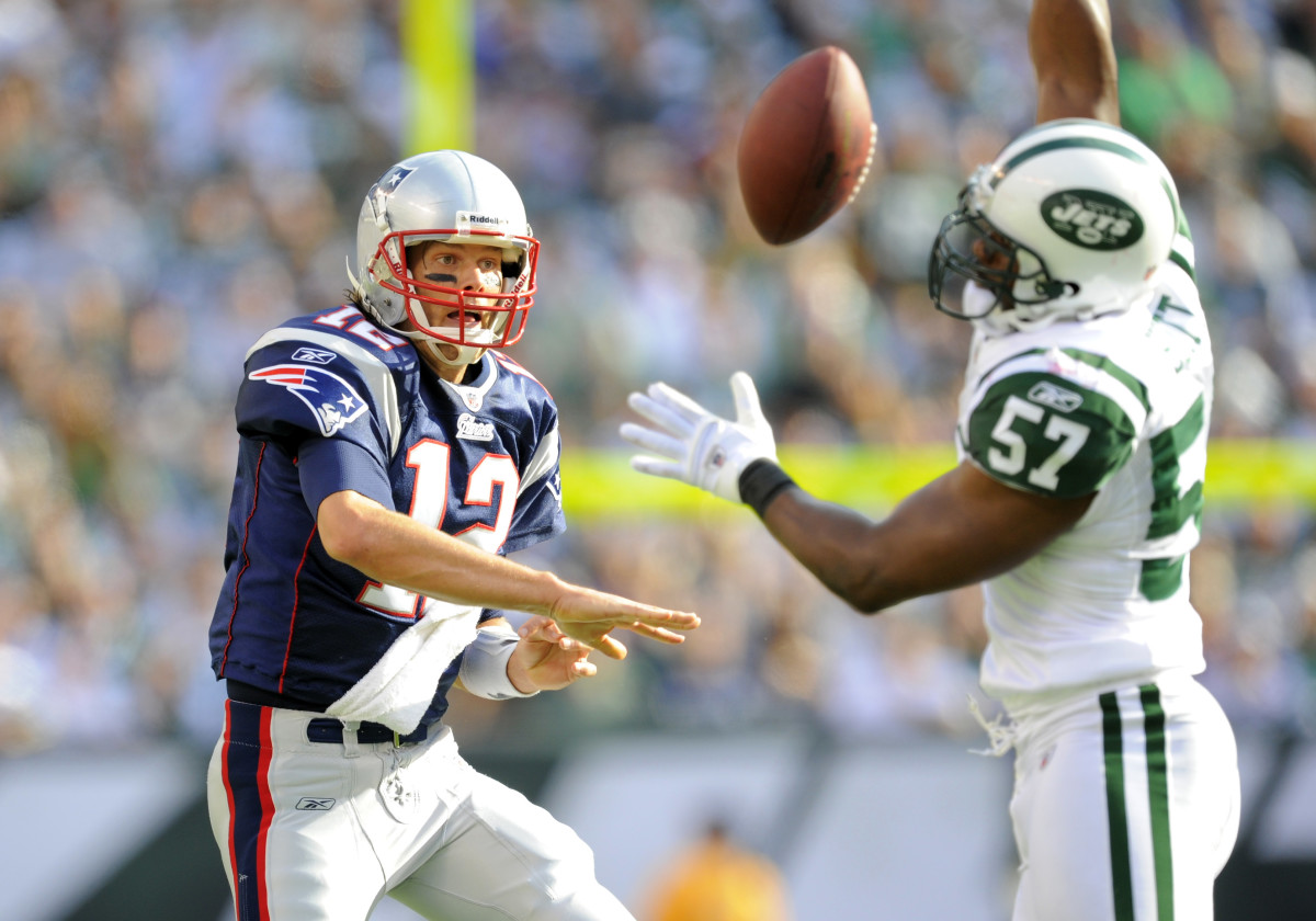 New England Patriots quarterback Tom Brady looks for the pass in