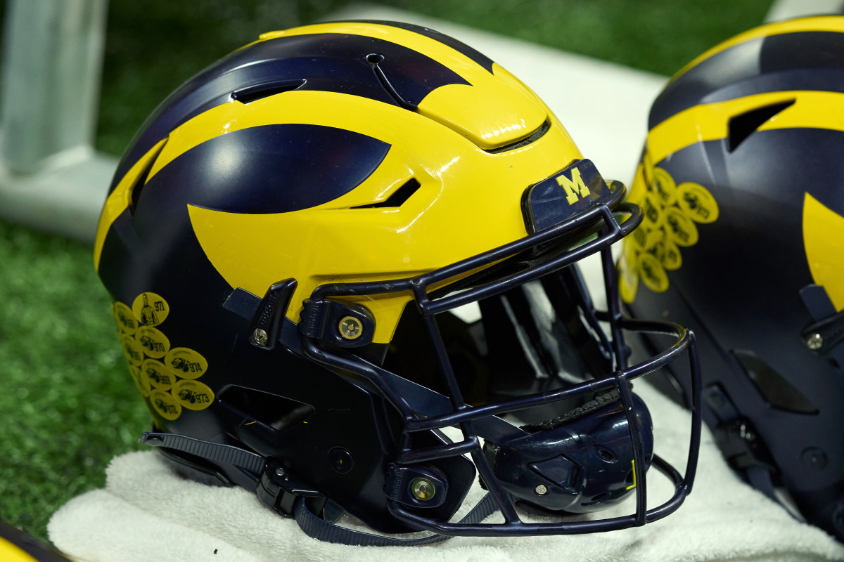 INDIANAPOLIS, IN - DECEMBER 04: A detail view of a Michigan Wolverines helmet is seen on an equipment cart during the Big Ten Championship Game between the Iowa Hawkeyes and the Michigan Wolverines on December 04, 2021, at Lucas Oil Stadium, in Indianapolis, IL. (Photo by Robin Alam/Icon Sportswire via Getty Images)