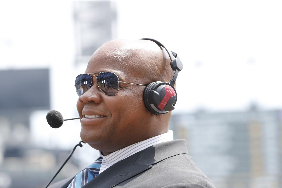 A headshot of Frank Thomas broadcasting a game.