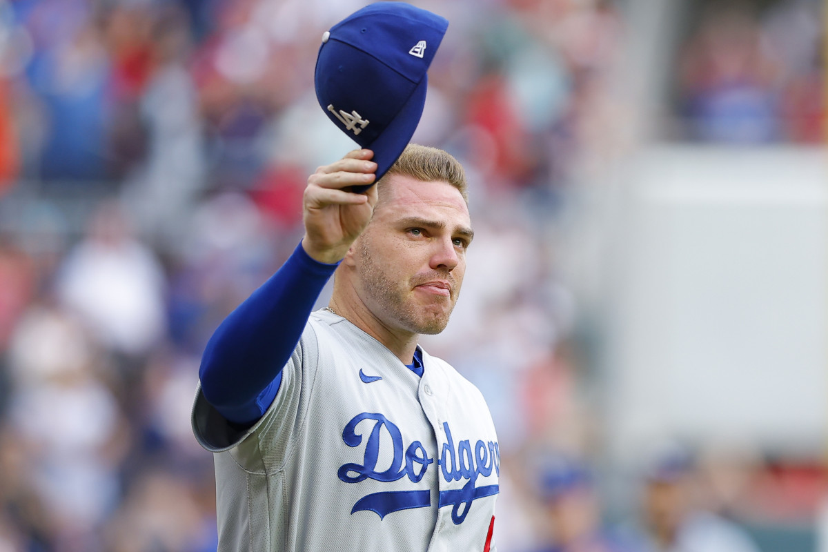 ATLANTA, GA - JUNE 24: Freddie Freeman #5 of the Los Angeles Dodgers gets emotional as he is introduced to the crowd prior to the game against the Atlanta Braves at Truist Park on June 24, 2022 in Atlanta, Georgia. (Photo by Todd Kirkland/Getty Images)