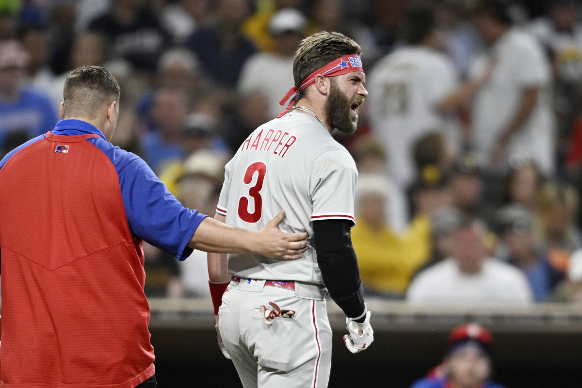 SAN DIEGO, CA - JUNE 25:  Bryce Harper #3 of the Philadelphia Phillies yells at Blake Snell #4 of the San Diego Padres after being hit with a pitch during the fourth inning of a baseball game June 25, 2022 at Petco Park in San Diego, California. (Photo by Denis Poroy/Getty Images)