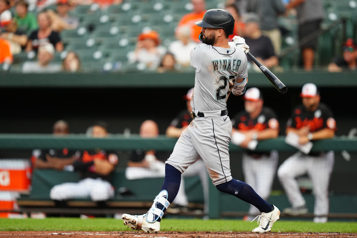 BALTIMORE, MD - JUNE 02: Jesse Winker #27 of the Seattle Mariners hits an RBI single in the third inning during the game between the Seattle Mariners and the Baltimore Orioles at Oriole Park at Camden Yards on Thursday, June 2, 2022 in Baltimore, Maryland. (Photo by Daniel Shirey/MLB Photos via Getty Images)