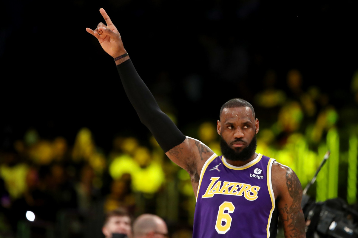 LOS ANGELES, CALIFORNIA - FEBRUARY 16: LeBron James #6 of the Los Angeles Lakers acknowledges the crowd during the game against the Utah Jazz at Crypto.com Arena on February 16, 2022 in Los Angeles, California. NOTE TO USER: User expressly acknowledges and agrees that, by downloading and or using this Photograph, user is consenting to the terms and conditions of the Getty Images License Agreement. (Photo by Katelyn Mulcahy/Getty Images)