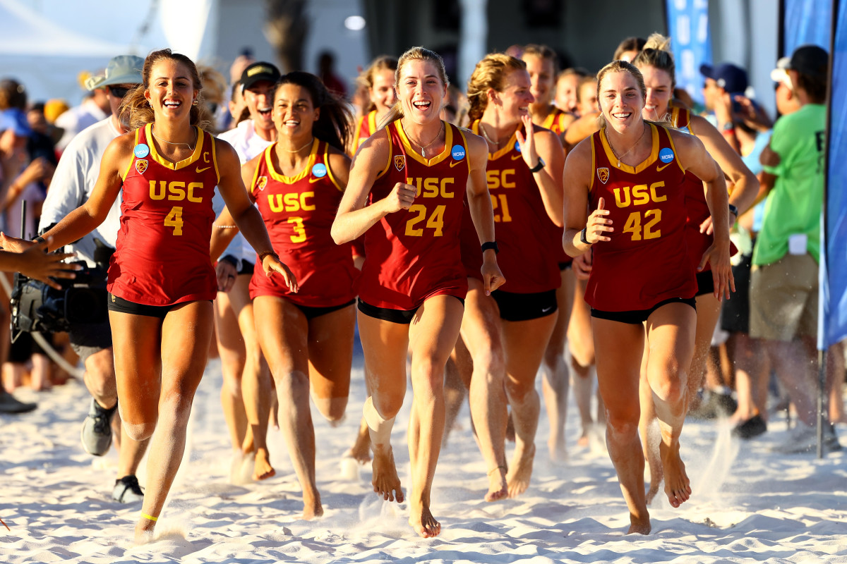 GULF SHORES, AL - MAY 08:The USC Trojans celebrate their victory against the Florida State Seminoles during the Division I Womens Beach Volleyball Championship held on May 8, 2022 in Gulf Shores, Alabama. (Photo by Jamie Schwaberow/NCAA Photos via Getty Images)