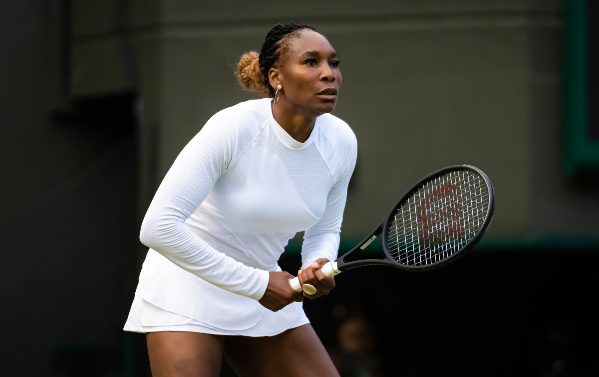Venus Williams on the court for the mixed doubles at Wimbledon.