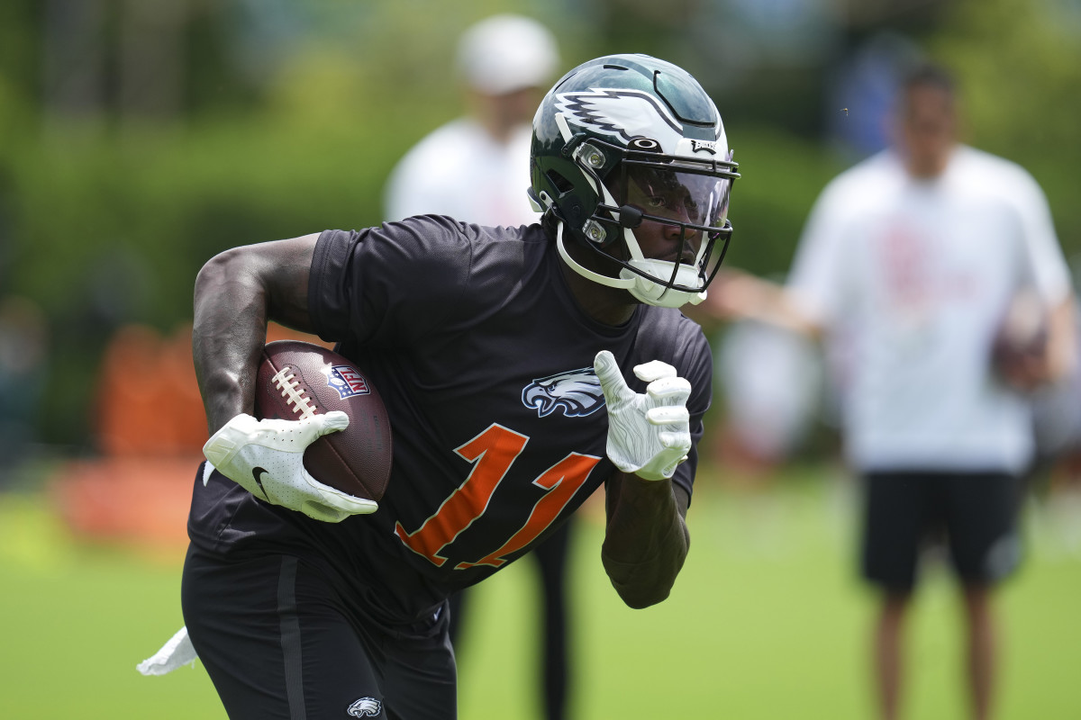 PHILADELPHIA, PA - JUNE 03: A.J. Brown #11 of the Philadelphia Eagles runs with the ball during OTAs at the NovaCare Complex on June 3, 2022 in Philadelphia, Pennsylvania. (Photo by Mitchell Leff/Getty Images)