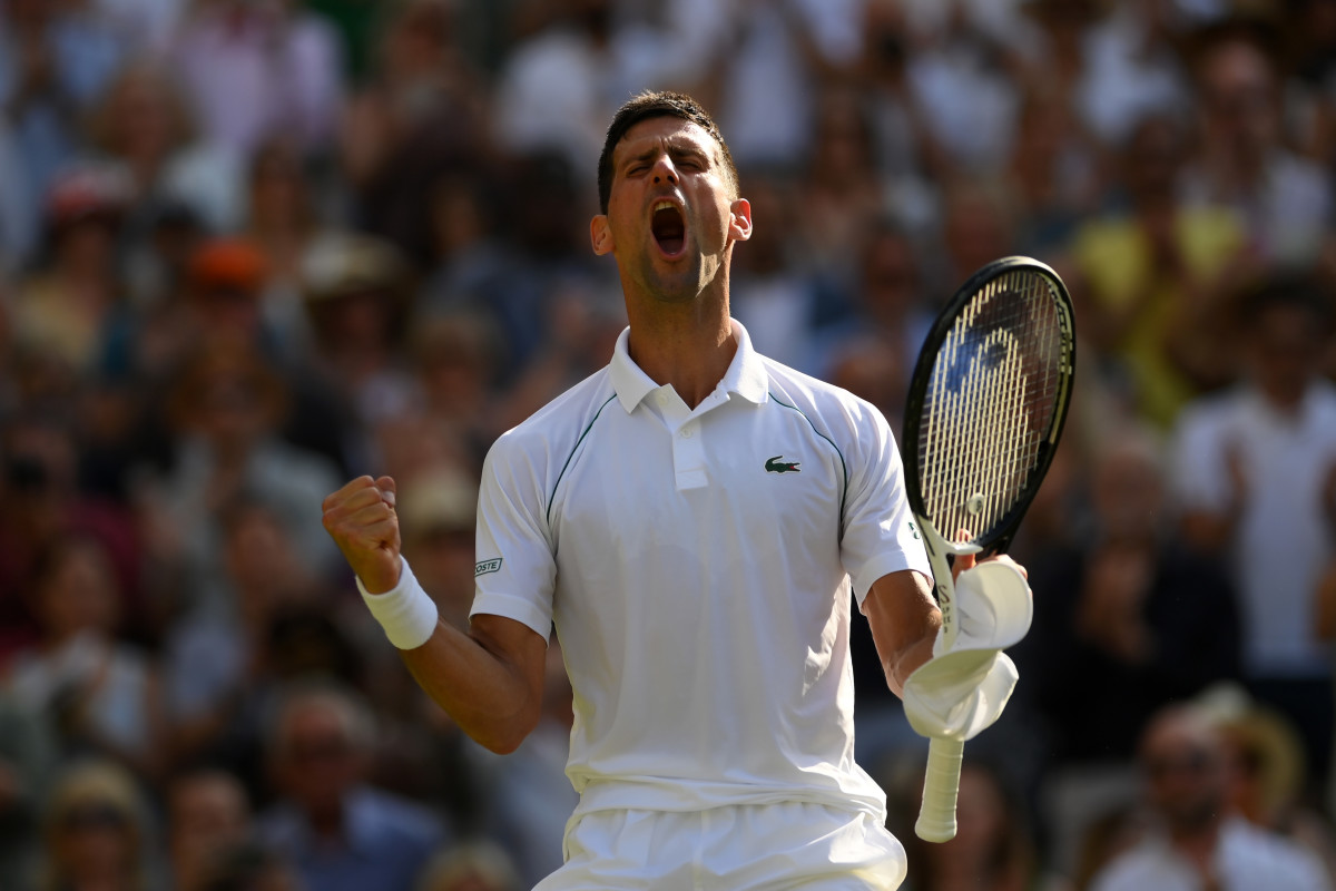 Novak Djokovic celebrates match point at Wimbledon.
