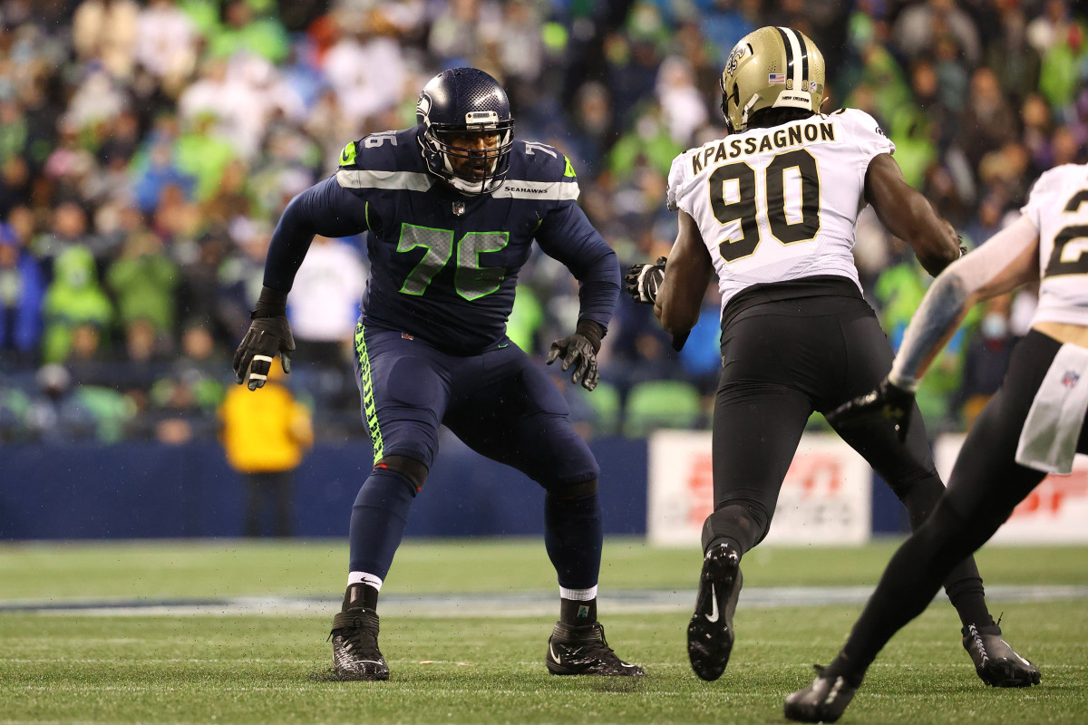 SEATTLE, WASHINGTON - OCTOBER 25: Duane Brown #76 of the Seattle Seahawks blocks during the fourth quarter against the New Orleans Saints at Lumen Field on October 25, 2021 in Seattle, Washington. (Photo by Abbie Parr/Getty Images)