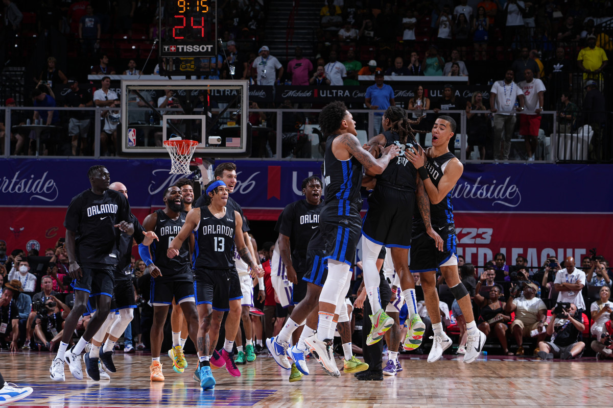 Las Vegas, NV - JULY 9: The Orlando Magic celebrate after winning the game against the Sacramento Kings during the 2022 Las Vegas Summer League on July 9, 2022 at the Thomas & Mack Center in Las Vegas, Nevada. NOTE TO USER: User expressly acknowledges and agrees that, by downloading and/or using this Photograph, user is consenting to the terms and conditions of the Getty Images License Agreement. Mandatory Copyright Notice: Copyright 2022 NBAE (Photo by Bart Young/NBAE via Getty Images)