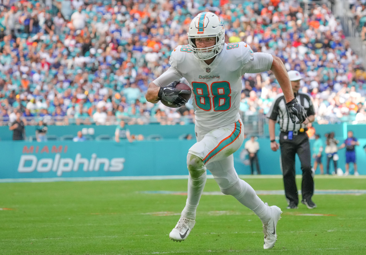 Miami Dolphins tight end Mike Gesicki (88) warms up before an NFL