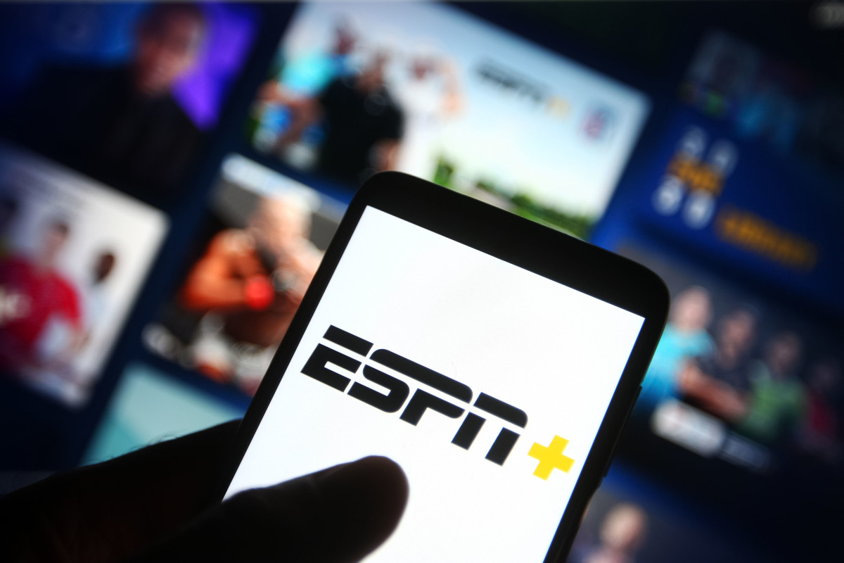 UKRAINE - 2021/07/19: In this photo illustration the ESPN+ (ESPN Plus) logo of an US video streaming service is seen on a smartphone with its website in the background. (Photo Illustration by Pavlo Gonchar/SOPA Images/LightRocket via Getty Images)