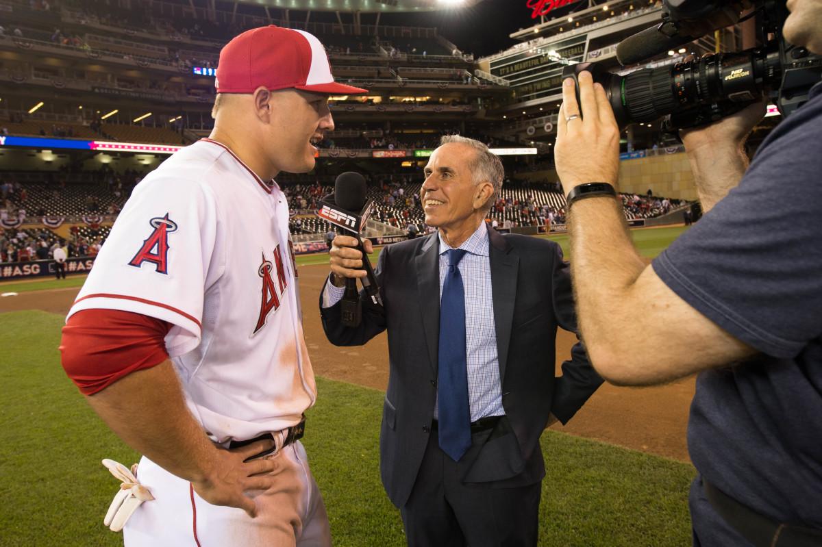 MINNEAPOLIS, MN - JULY 14:  Mike Trout #27 of the Los Angeles Angels talks with ESPN analyst Tim Kurkjian after winning the 85th MLB All-Star Game at Target Field on Tuesday, July 15, 2014 in Minneapolis, Minnesota. (Photo by Ron Vesely/MLB via Getty Images)