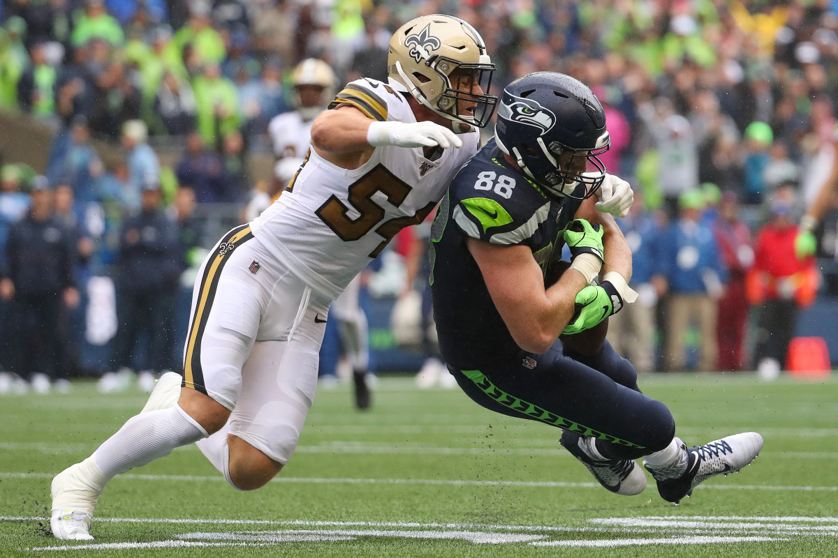Kiko Alonso tackles a Seahawks player while playing for the Saints.