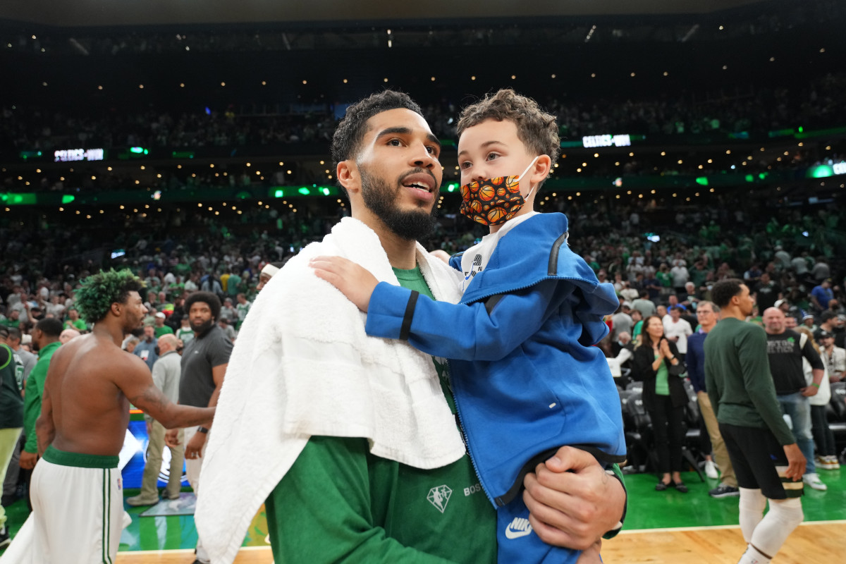 BOSTON, MA - MAY 15: Jayson Tatum #0 of the Boston Celtics and his son, Deuce Tatum, seen after Game 7 of the 2022 NBA Playoffs Eastern Conference Semifinals on May 15, 2022 at TD Garden in Boston, Massachusets. NOTE TO USER: User expressly acknowledges and agrees that, by downloading and/or using this Photograph, user is consenting to the terms and conditions of the Getty Images License Agreement. Mandatory Copyright Notice: Copyright 2022 NBAE (Photo by Jesse D. Garrabrant/NBAE via Getty Images)