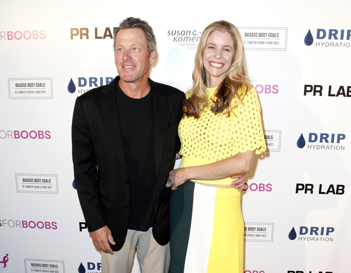 Lance Armstrong and his wife, Anna, attend Babes for Boobs Live Auction.