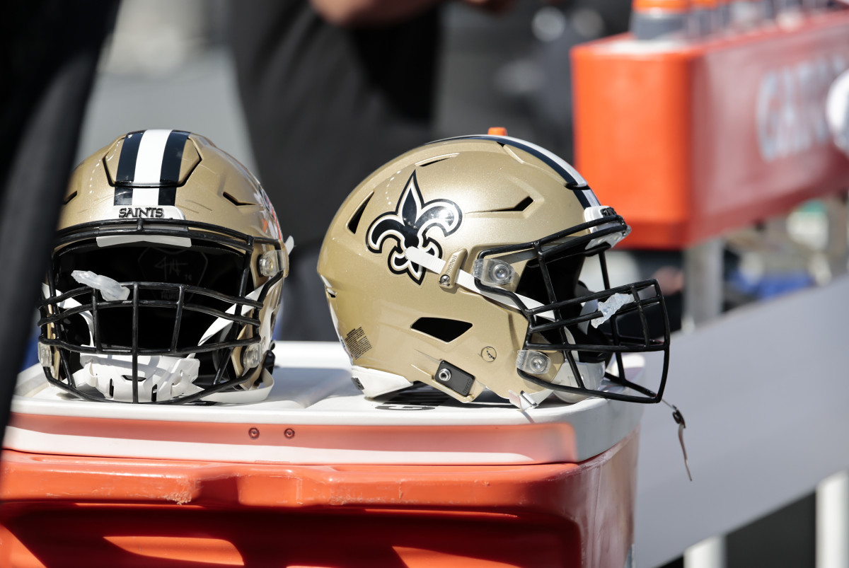 A general shot of two Saints helmets during a game.
