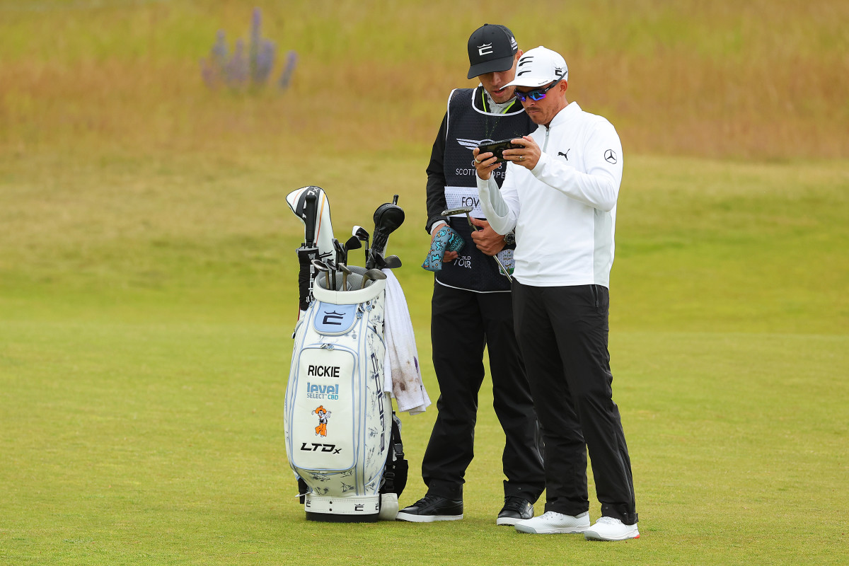 NORTH BERWICK, SCOTLAND - JULY 06: Rickie Fowler of the United States looks on with their Caddie on the 1st hole during a practice round prior to the Genesis Scottish Open at The Renaissance Club on July 06, 2022 in North Berwick, Scotland. (Photo by Kevin C. Cox/Getty Images)