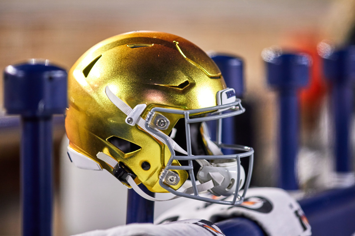 A Notre Dame helmet seen on a Bench holder.