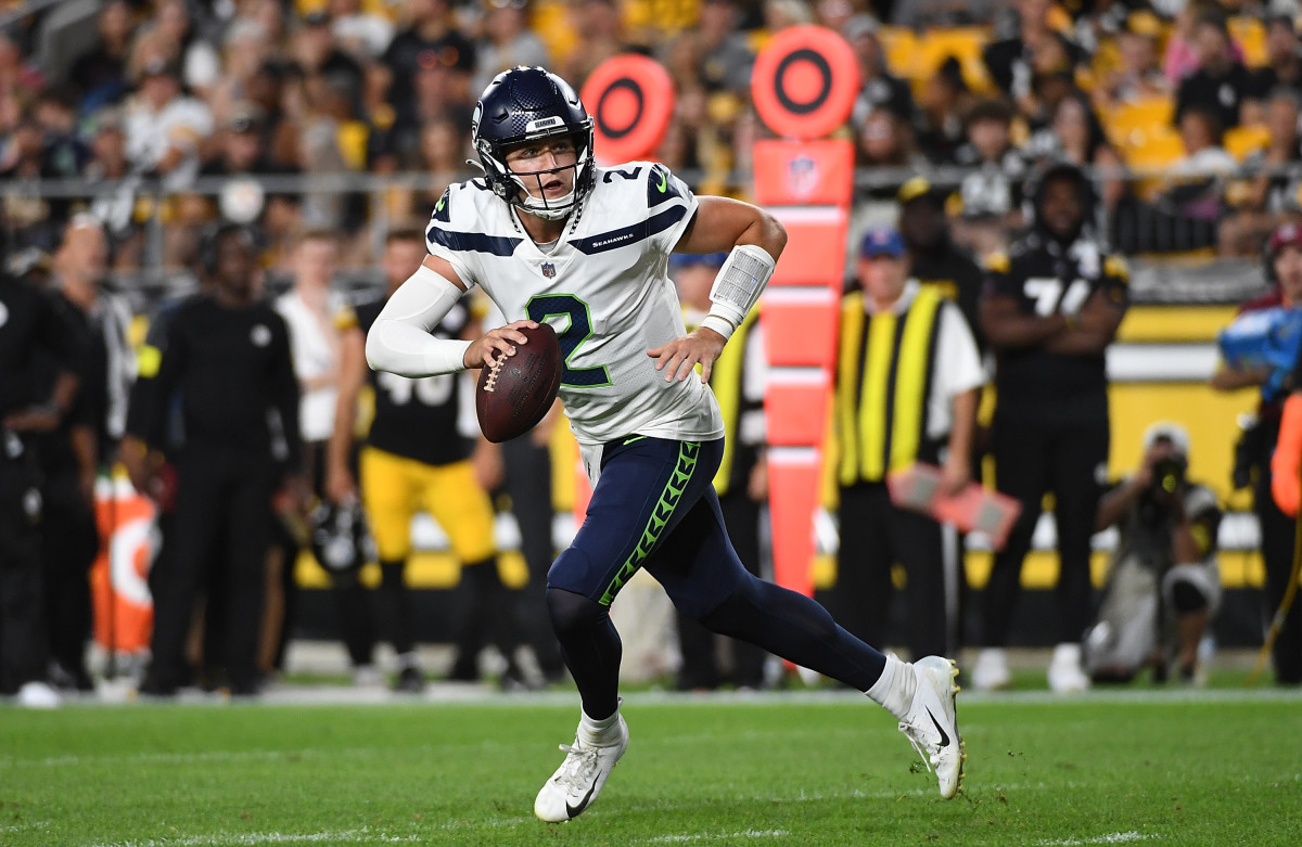 PITTSBURGH, PA - AUGUST 13: Drew Lock #2 of the Seattle Seahawks scrambles out of the pocket in the fourth quarter during a preseason game against the Pittsburgh Steelers at Acrisure Stadium on August 13, 2022 in Pittsburgh, Pennsylvania. (Photo by Justin Berl/Getty Images)