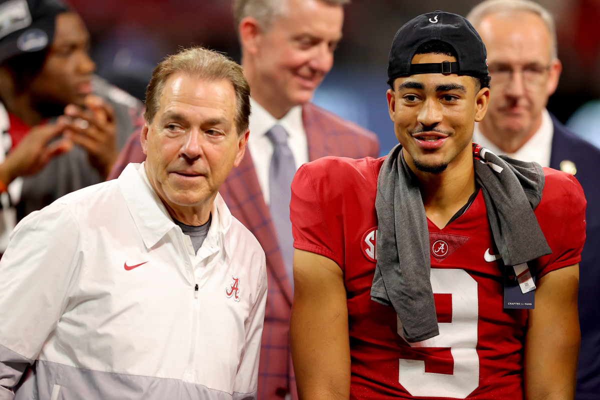 Nick Saban on the field with Bryce Young after the SEC Championship.