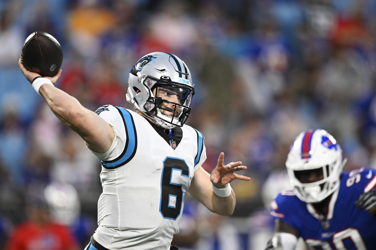 Baker Mayfield attempting a pass for the Carolina Panthers.