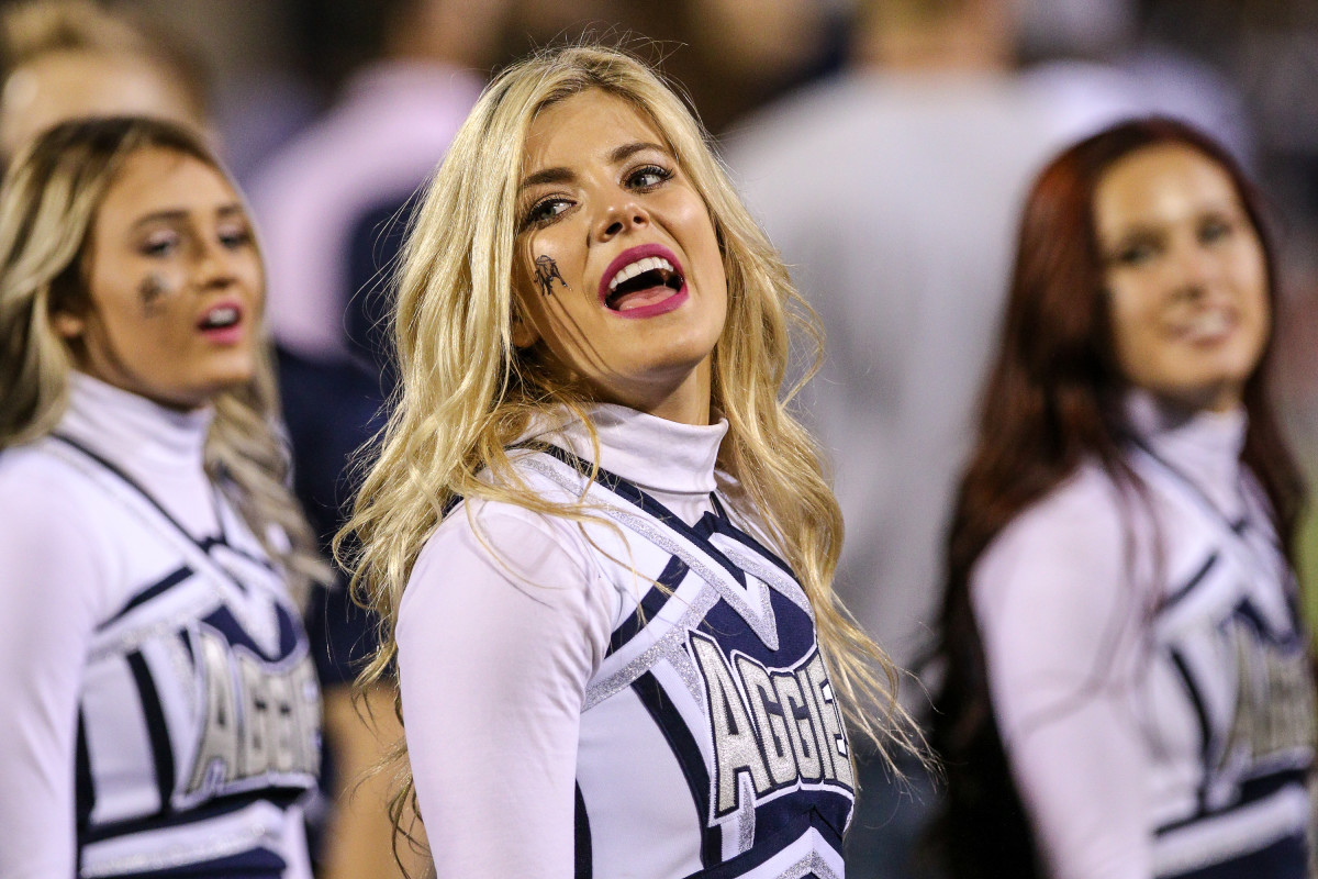 Utah State Aggies cheerleaders go viral on the field during a game.