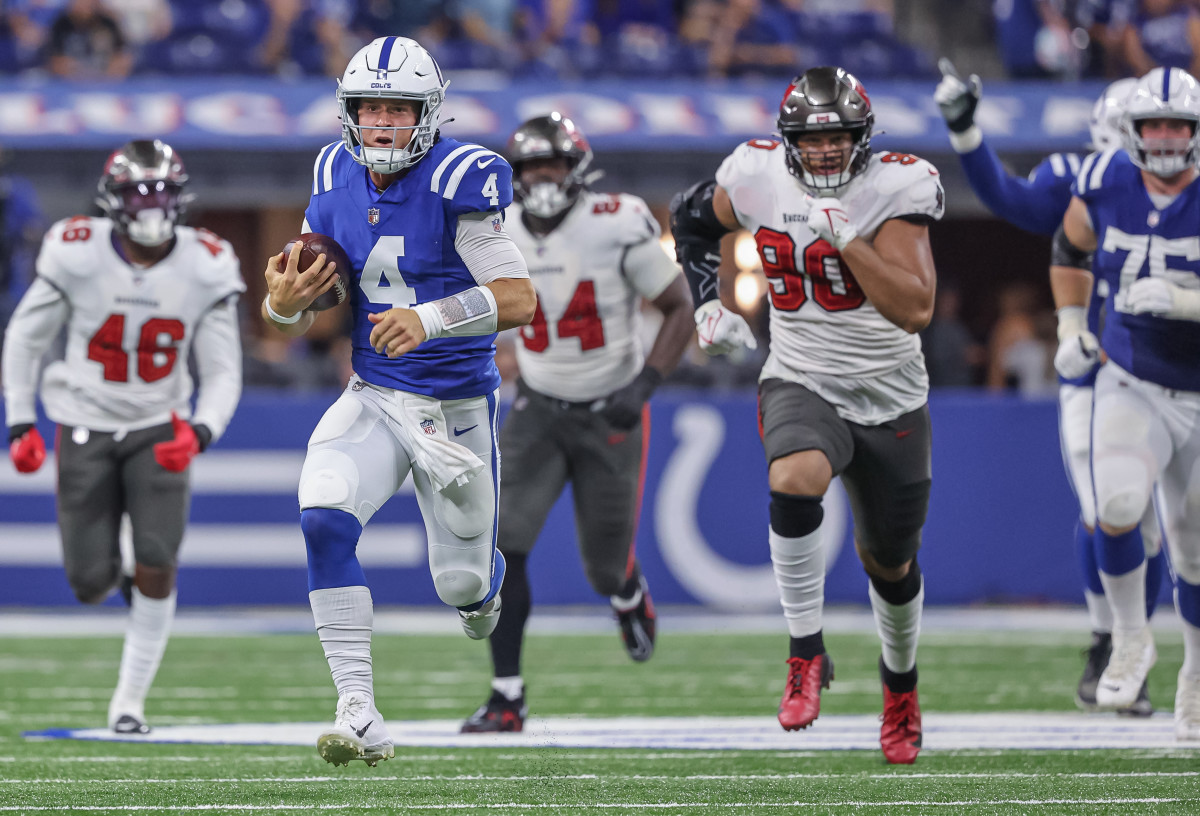 Sam Ehlinger running with the football for the Colts.