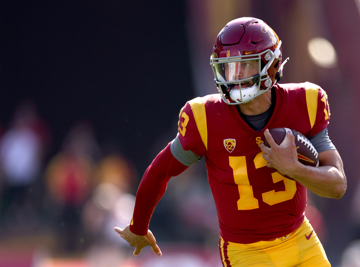 LOS ANGELES, CALIFORNIA - SEPTEMBER 03: Caleb Williams #13 of the USC Trojans scrambles out of the pocket during the second quarter against the Rice Owls at United Airlines Field at the Los Angeles Memorial Coliseum on September 03, 2022 in Los Angeles, California. (Photo by Harry How/Getty Images)