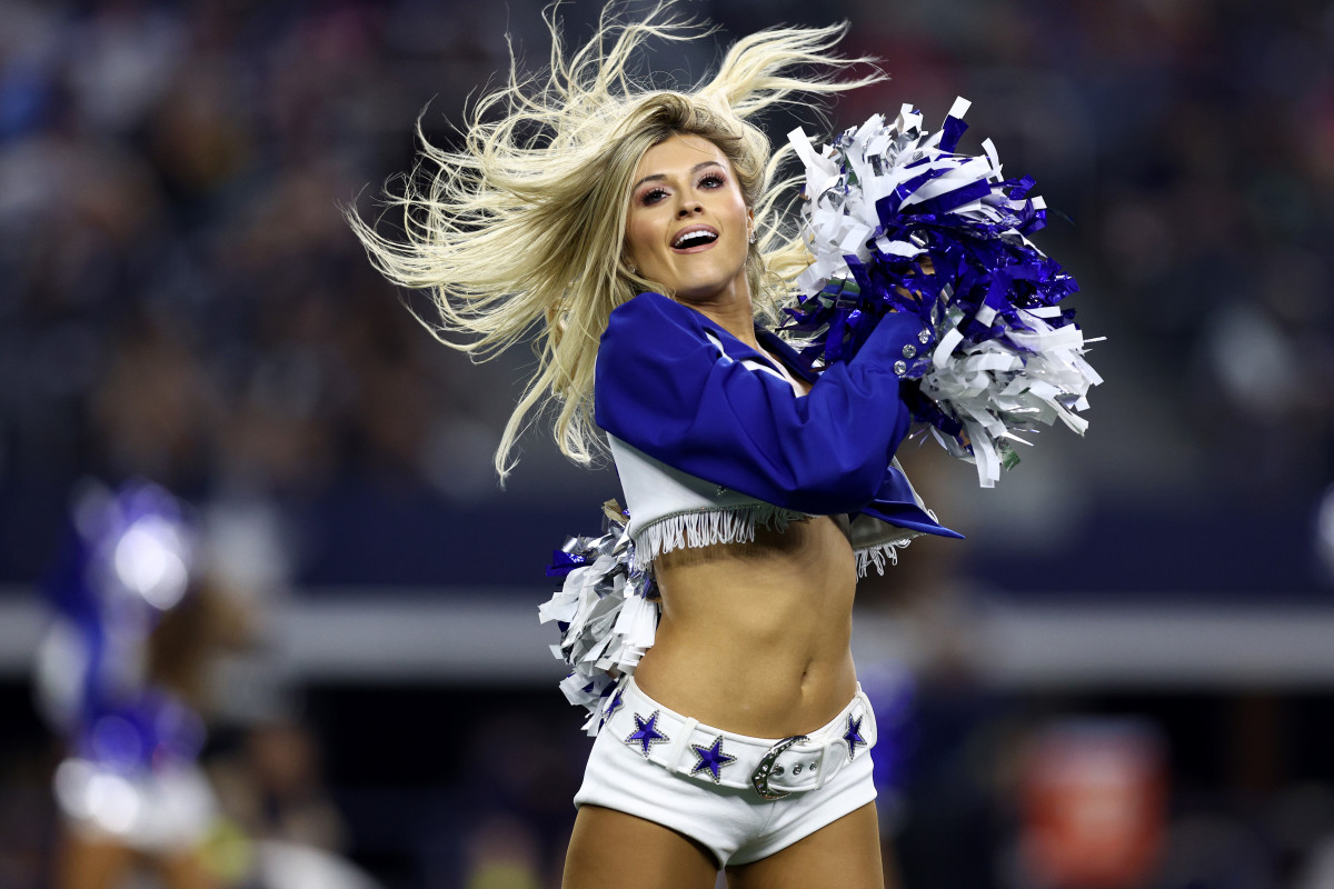 Cowboys cheerleaders perform during a game.