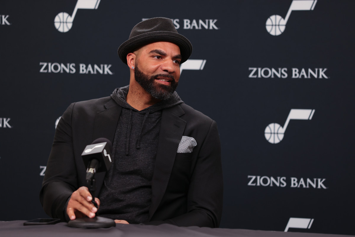 Carlos Boozer speaks to the media in a press conference in Utah.