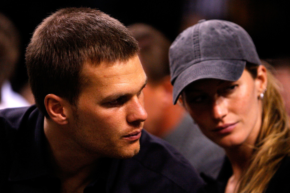 Tom Brady and his wife, Gisele, attend an NBA playoff game in Boston.