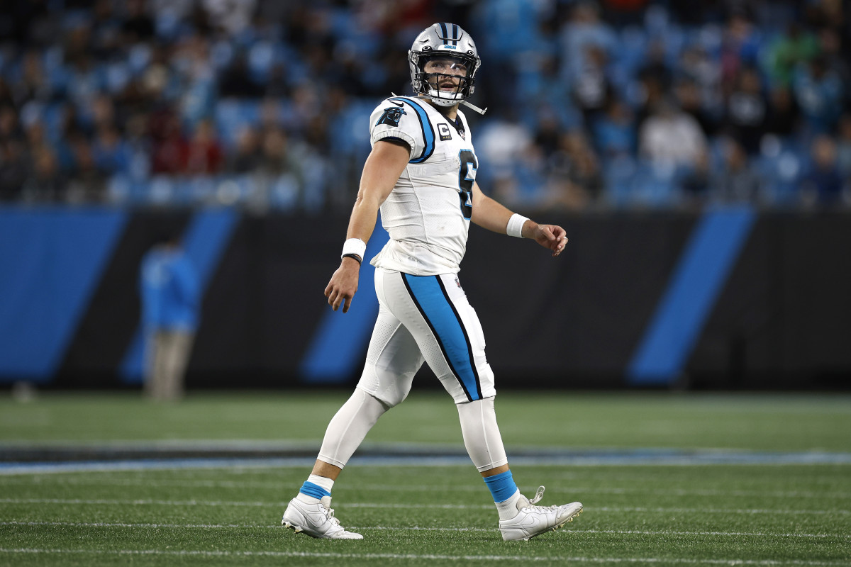Panthers quarterback Baker Mayfield walks off the field on Sunday.