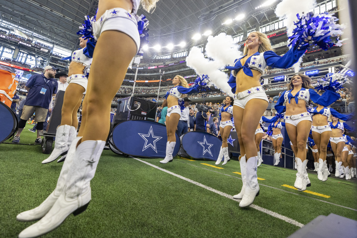 ARLINGTON, TEXAS - SEPTEMBER 18: Dallas Cowboy Cheerleaders perform before a game against the Cincinnati Bengals at AT&T Stadium on September 18, 2022 in Arlington, Texas. The Cowboys defeated the Bengals 20-17.  (Photo by Wesley Hitt/Getty Images)