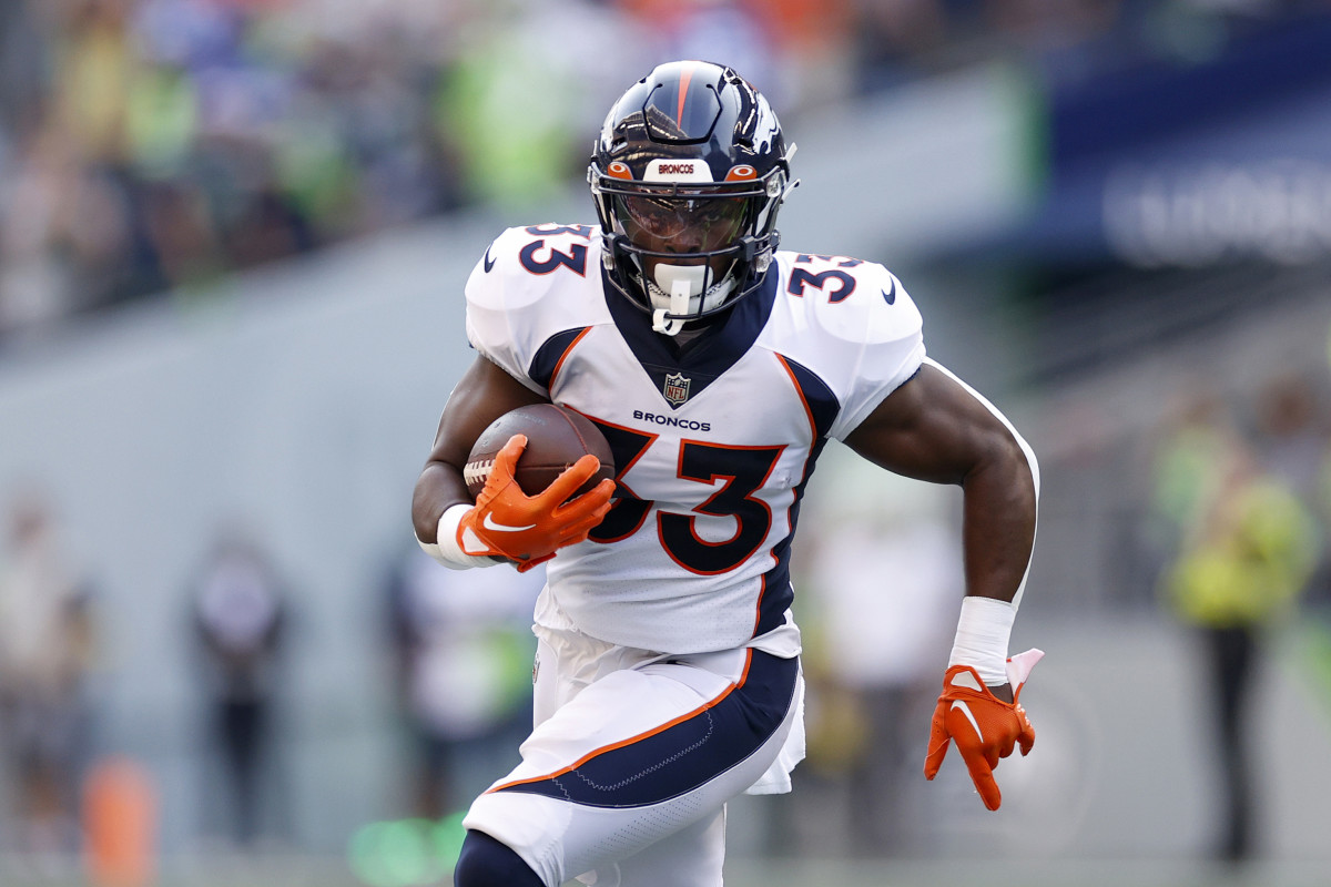 Broncos running back Javonte Williams carries the ball against the Seattle Seahawks.