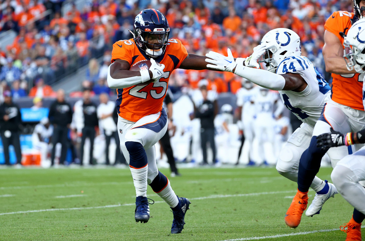 DENVER, COLORADO - OCTOBER 06: Melvin Gordon III #25 of the Denver Broncos rushes during a game against the Indianapolis Colts at Empower Field At Mile High on October 06, 2022 in Denver, Colorado. (Photo by Justin Tafoya/Getty Images)